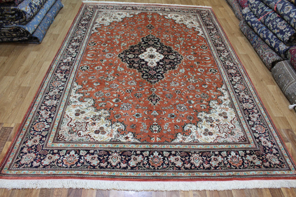 A good example of a Persian Qum silk rug with fine weave and floral design 300 x 200 cm