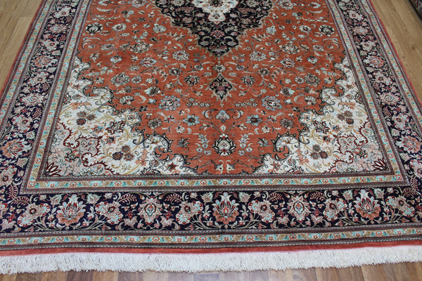 A good example of a Persian Qum silk rug with fine weave and floral design 300 x 200 cm