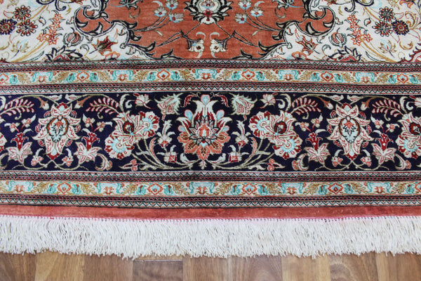 A good example of a Persian Qum silk rug with fine weave and floral design 300 x 200 cm