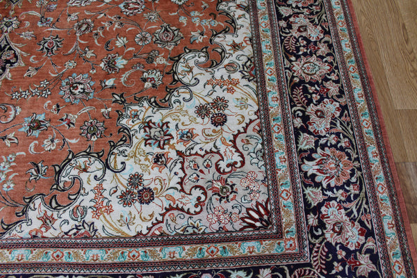 A good example of a Persian Qum silk rug with fine weave and floral design 300 x 200 cm