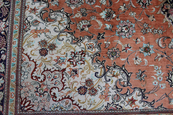 A good example of a Persian Qum silk rug with fine weave and floral design 300 x 200 cm