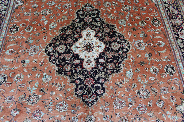 A good example of a Persian Qum silk rug with fine weave and floral design 300 x 200 cm