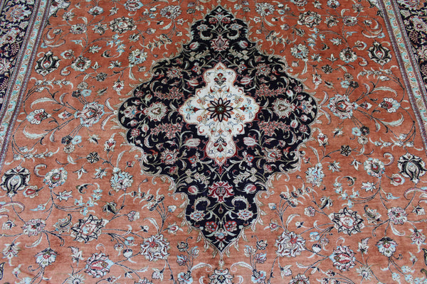 A good example of a Persian Qum silk rug with fine weave and floral design 300 x 200 cm