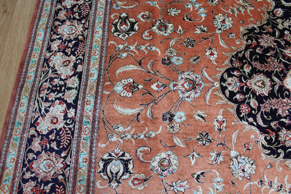 A good example of a Persian Qum silk rug with fine weave and floral design 300 x 200 cm