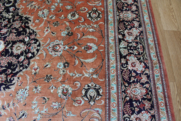 A good example of a Persian Qum silk rug with fine weave and floral design 300 x 200 cm