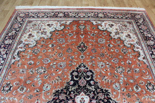 A good example of a Persian Qum silk rug with fine weave and floral design 300 x 200 cm