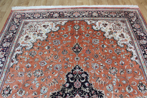 A good example of a Persian Qum silk rug with fine weave and floral design 300 x 200 cm