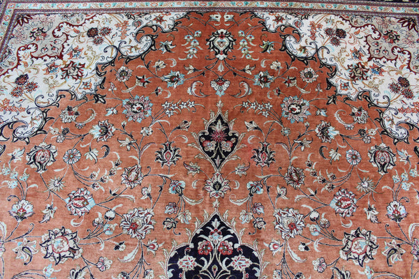 A good example of a Persian Qum silk rug with fine weave and floral design 300 x 200 cm