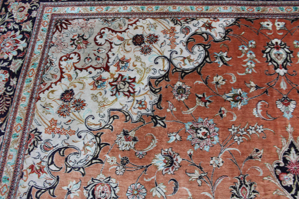 A good example of a Persian Qum silk rug with fine weave and floral design 300 x 200 cm