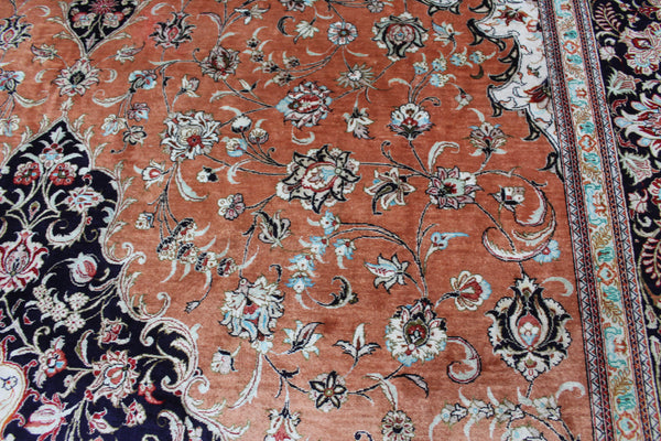 A good example of a Persian Qum silk rug with fine weave and floral design 300 x 200 cm