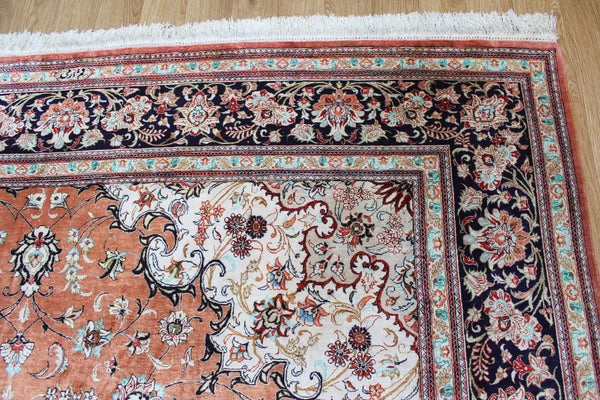 A good example of a Persian Qum silk rug with fine weave and floral design 300 x 200 cm