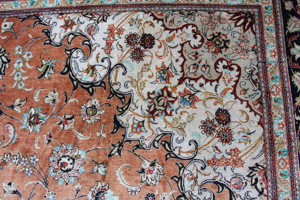 A good example of a Persian Qum silk rug with fine weave and floral design 300 x 200 cm