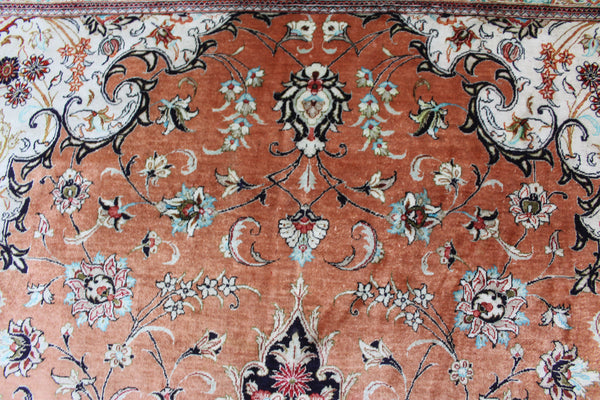 A good example of a Persian Qum silk rug with fine weave and floral design 300 x 200 cm