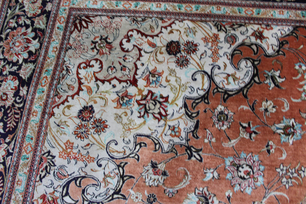 A good example of a Persian Qum silk rug with fine weave and floral design 300 x 200 cm