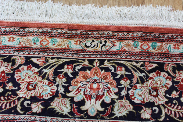 A good example of a Persian Qum silk rug with fine weave and floral design 300 x 200 cm