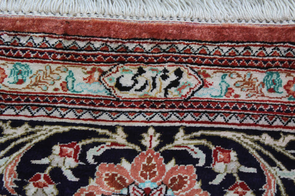 A good example of a Persian Qum silk rug with fine weave and floral design 300 x 200 cm