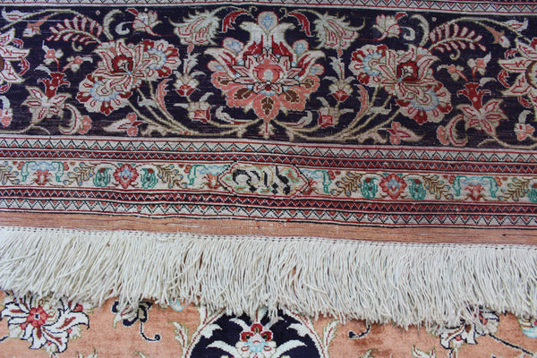 A good example of a Persian Qum silk rug with fine weave and floral design 300 x 200 cm