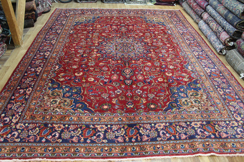 Vintage Persian Mashad carpet of classic medallion design and outstanding colour 380 x 293 cm