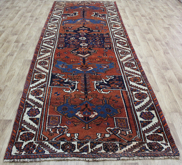 AN OUTSTANDING PERSIAN SHIRAZ LONG RUNNER 380 X 130 CM