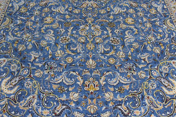 SIGNED PERSIAN KASHAN CARPET BLUE AND GOLD FLORAL DESIGN 397 X 283 CM