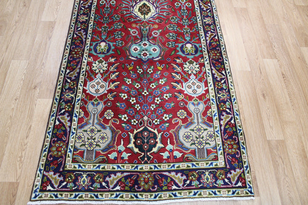 AN OUTSTANDING PERSIAN TABRIZ RUNNER WITH ALLOVER VASE DESIGN 375 X 100 CM