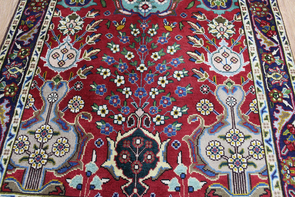 AN OUTSTANDING PERSIAN TABRIZ RUNNER WITH ALLOVER VASE DESIGN 375 X 100 CM