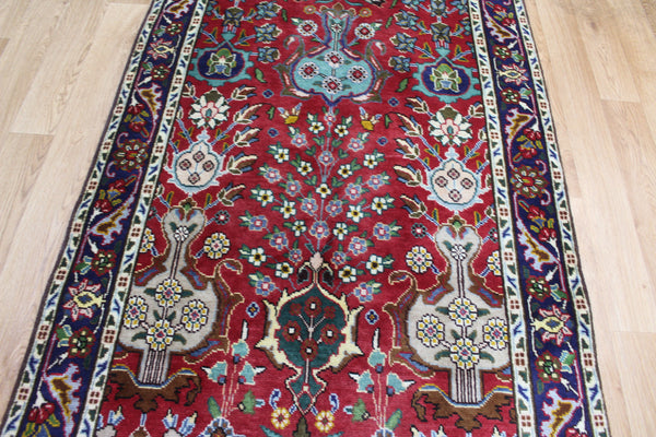 AN OUTSTANDING PERSIAN TABRIZ RUNNER WITH ALLOVER VASE DESIGN 375 X 100 CM