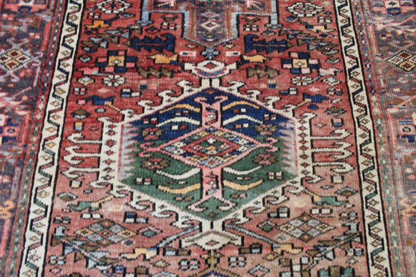Antique Karaja runner of traditional design with seven medallions Circa 1900